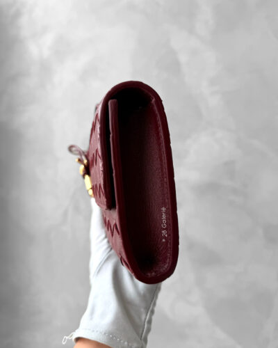 Bottega Veneta Burgundy Andiamo Clutch in Intrecciato Calfskin and Gold Hardware