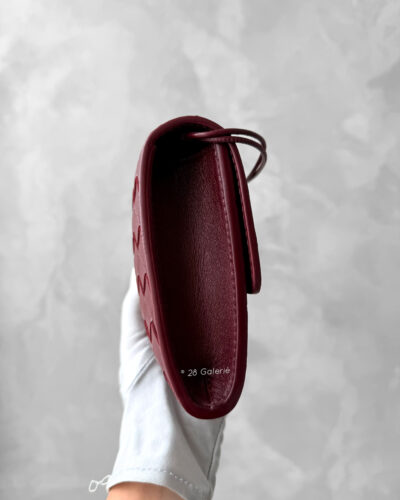 Bottega Veneta Burgundy Andiamo Clutch in Intrecciato Calfskin and Gold Hardware