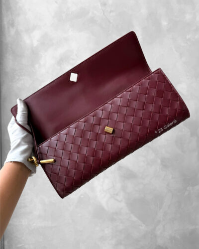 Bottega Veneta Burgundy Andiamo Clutch in Intrecciato Calfskin and Gold Hardware