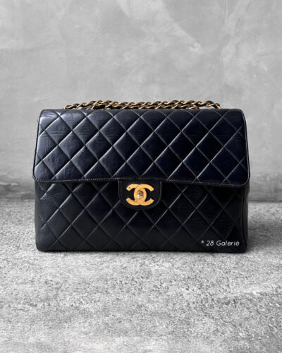 Chanel Black Jumbo Flap in Lambskin Leather and Gold Hardware