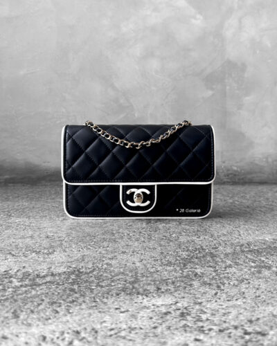 Chanel 25P Black/White Seasonal WOC in Lambskin Leather and Light Gold Hardware