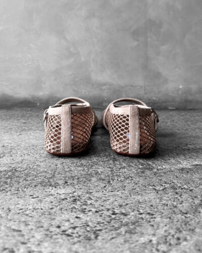 Alaïa Nude Suede Ballet Flats, crafted from soft suede with a timeless, elegant silhouette for versatile everyday wear.