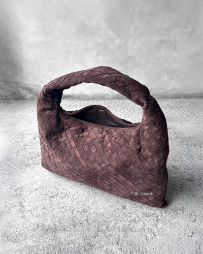 Bottega Veneta Small Brown Hop Hobo Bag in signature Intrecciato suede. A soft, timeless design that combines luxury craftsmanship with everyday elegance.