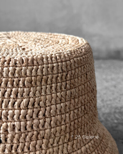 Loewe Natural Raffia Bucket Hat, a lightweight woven design with casual elegance and signature luxury detailing.