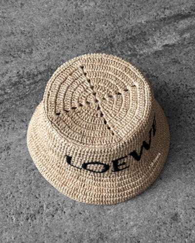 Loewe Natural Raffia Bucket Hat, a lightweight woven design with casual elegance and signature luxury detailing.