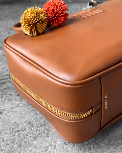 Miu Miu Cognac Large Leather Beau Bag, a structured and spacious design that blends timeless elegance with modern sophistication.