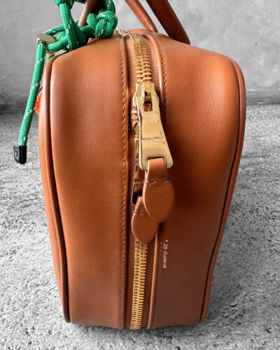 Miu Miu Cognac Large Leather Beau Bag, a structured and spacious design that blends timeless elegance with modern sophistication.